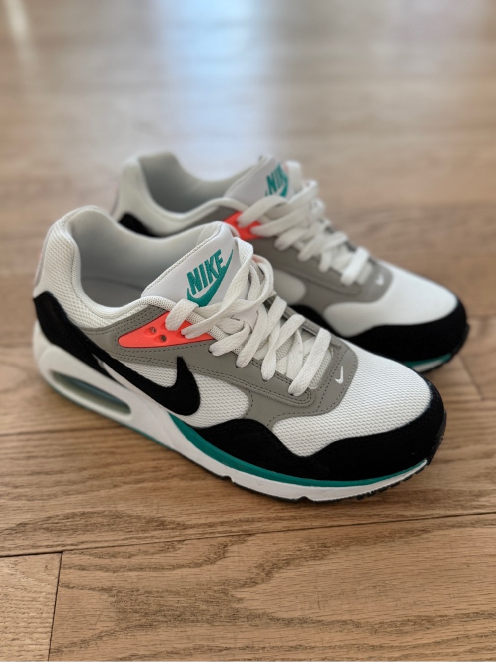 Women's Nike Air Max Correlate
Sneakers in Black White Teal
Neon Coral 8